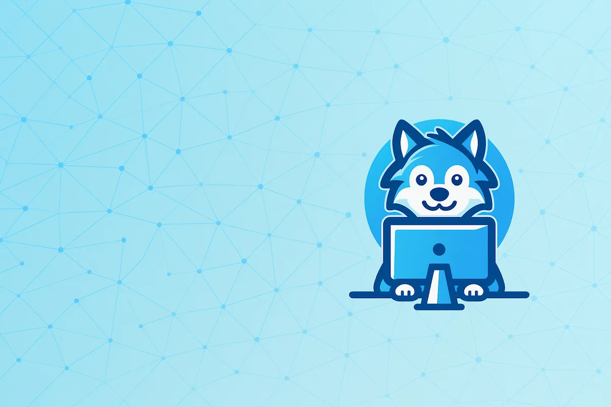 Wolfy, la mascotte de Wolfy Dev, devant son écran